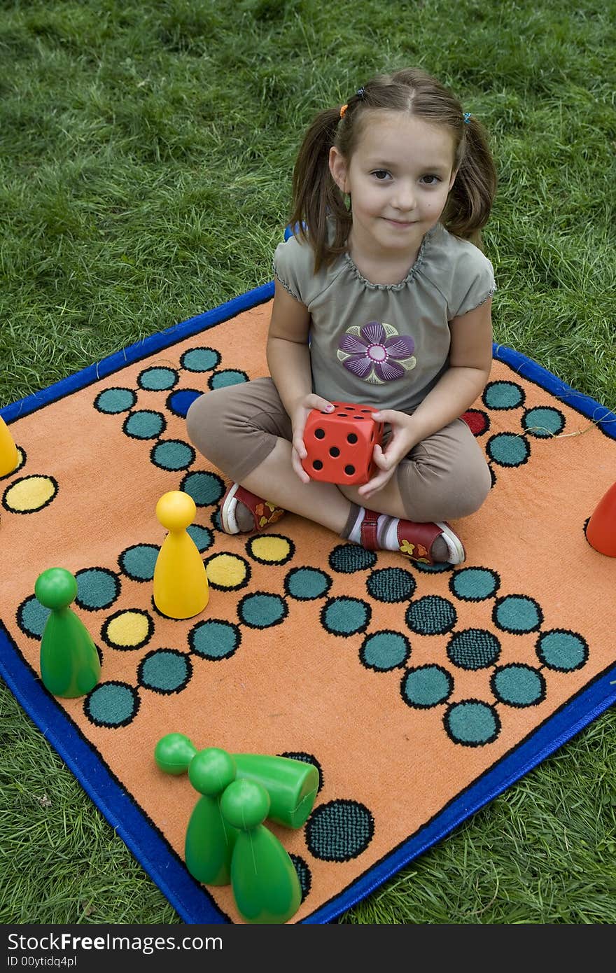 Child Playing With A Board