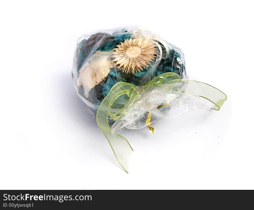 Green Potpourri in a plastic bag, on a white background. Green Potpourri in a plastic bag, on a white background