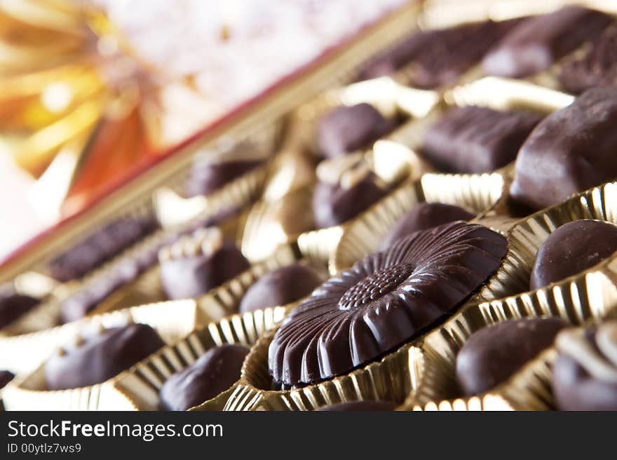 Chocolate sweets in box close up