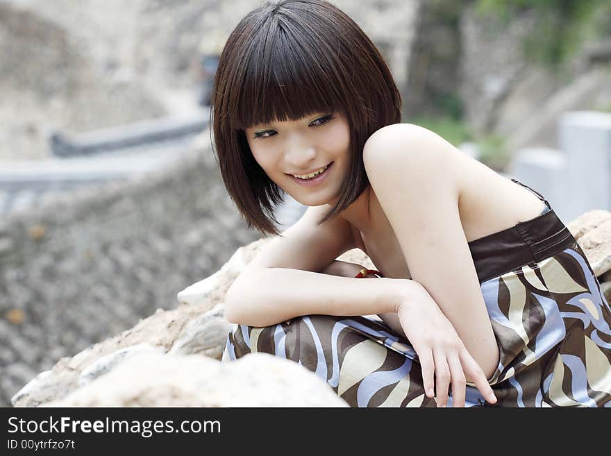 A Chinese girl in the ancient village. This ancient village has 500 years of history.