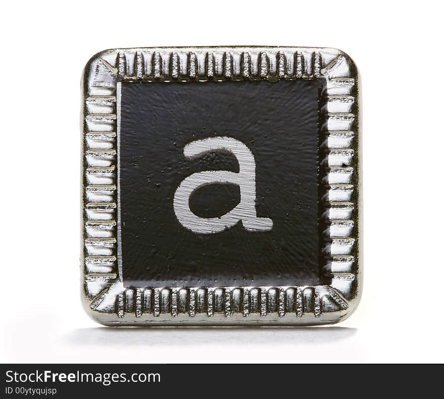 The letter a on a metal pin