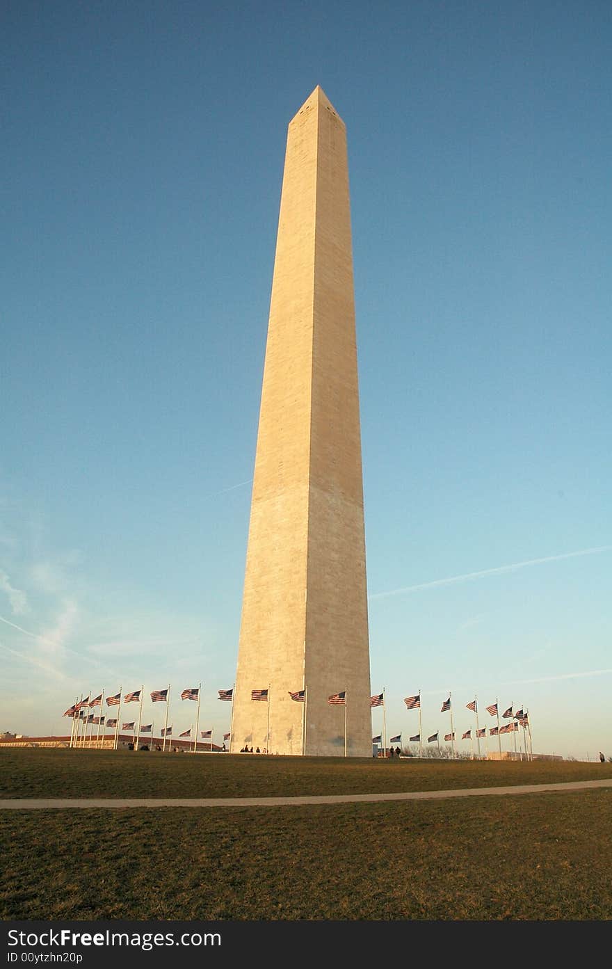 Partial view of the Washington
Monument and the American flags. Partial view of the Washington
Monument and the American flags