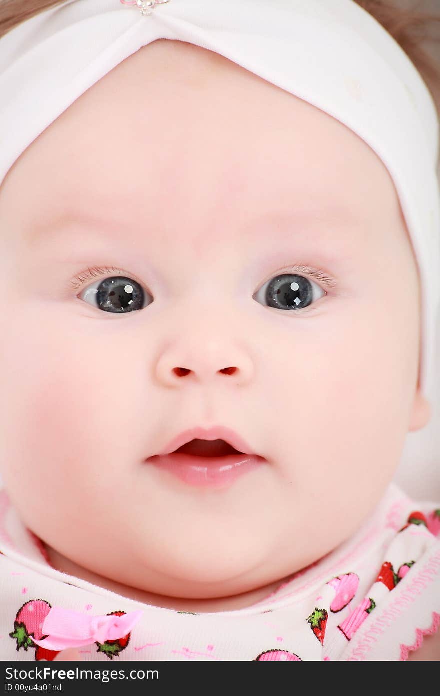 Beautiful baby. Shot in studio. Isolated on white. Beautiful baby. Shot in studio. Isolated on white.