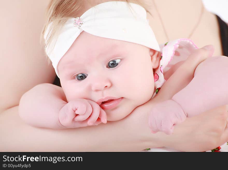 Beautiful baby. Shot in studio. Isolated on white. Beautiful baby. Shot in studio. Isolated on white.