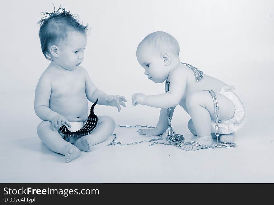 Beautiful fun babies. Shot in studio. Beautiful fun babies. Shot in studio.