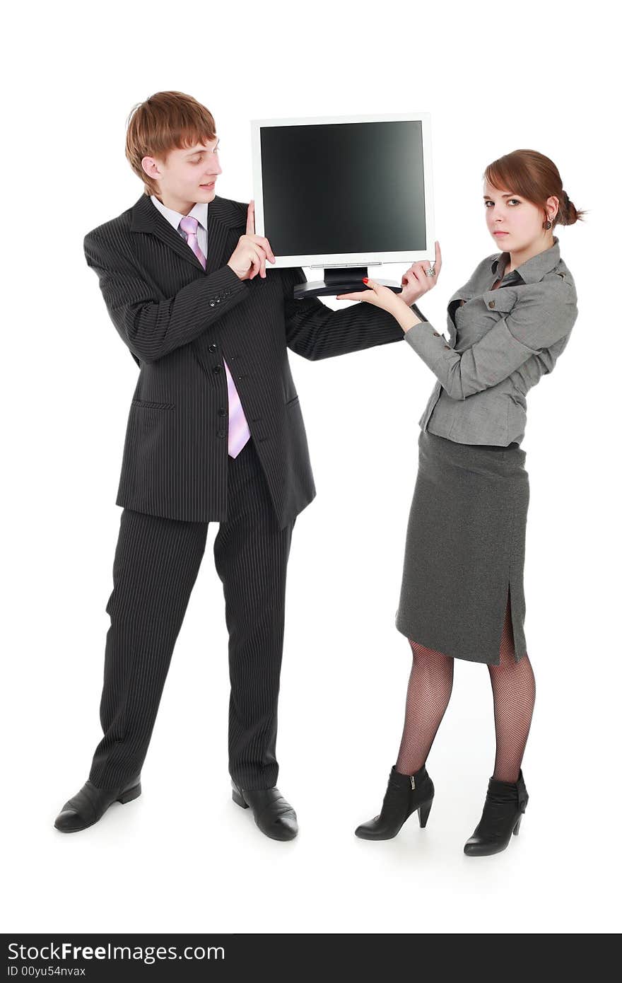 Group of business people working together. Shot in studio. Group of business people working together. Shot in studio.