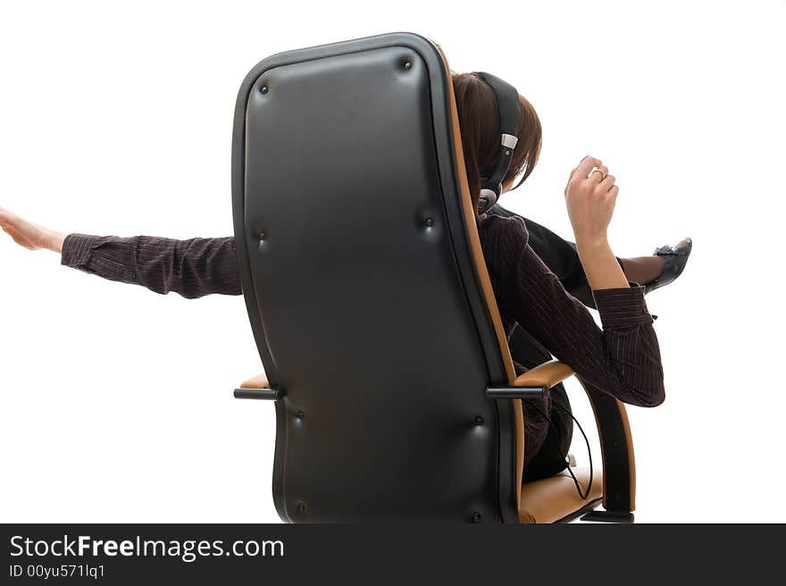 Young Business Woman On Armchair Speaks By Phone.