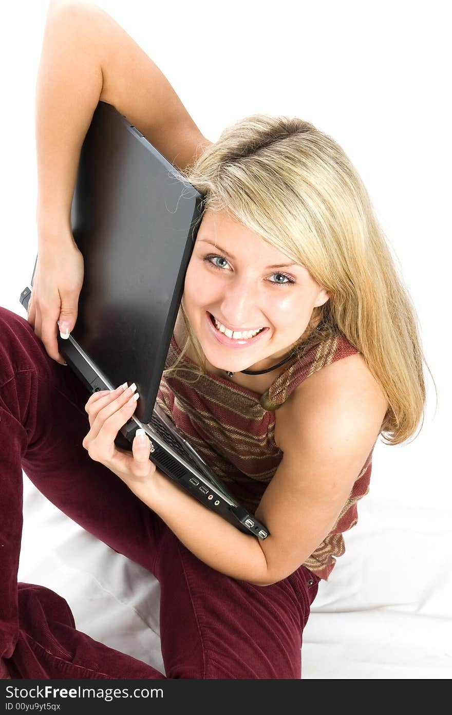 Beautiful girl smile with laptop on white background