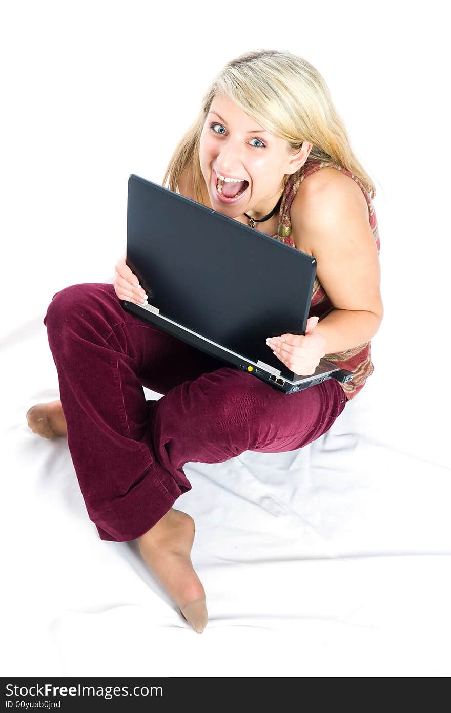 Beautiful girl smile with laptop on white background