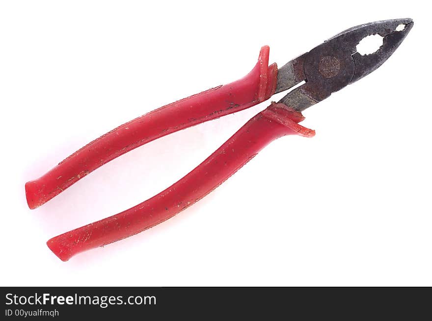 Combination pliers with red plastic handle on the white background. Combination pliers with red plastic handle on the white background.