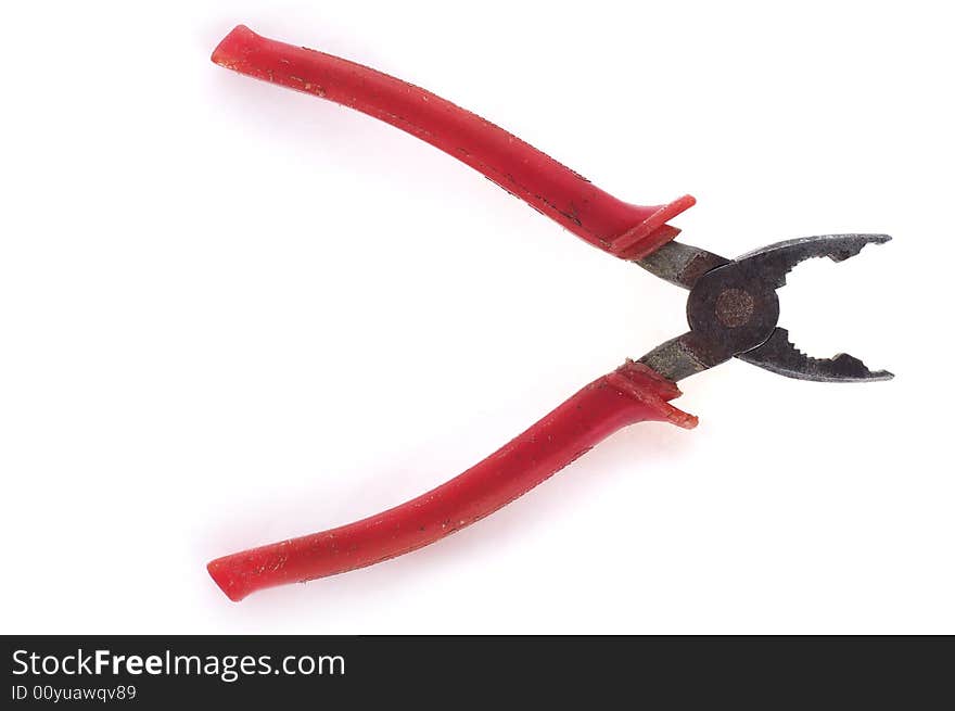 Combination pliers with red plastic handle on the white background. Combination pliers with red plastic handle on the white background.