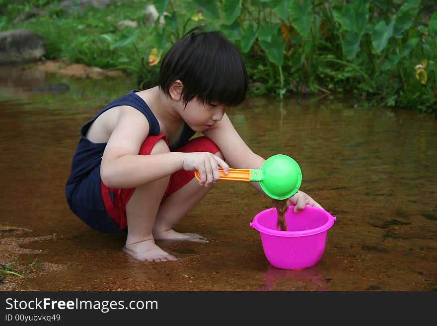 Boy At The River