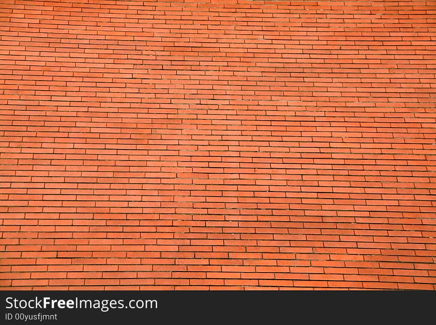 Background or pattern of a big red orange brick wall. Background or pattern of a big red orange brick wall