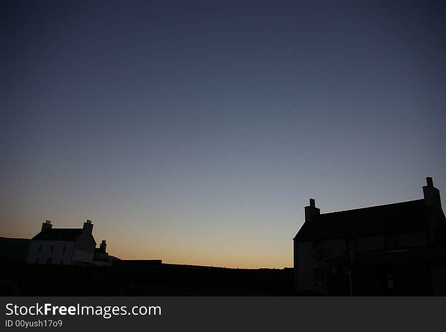 Shetland houses at sunset