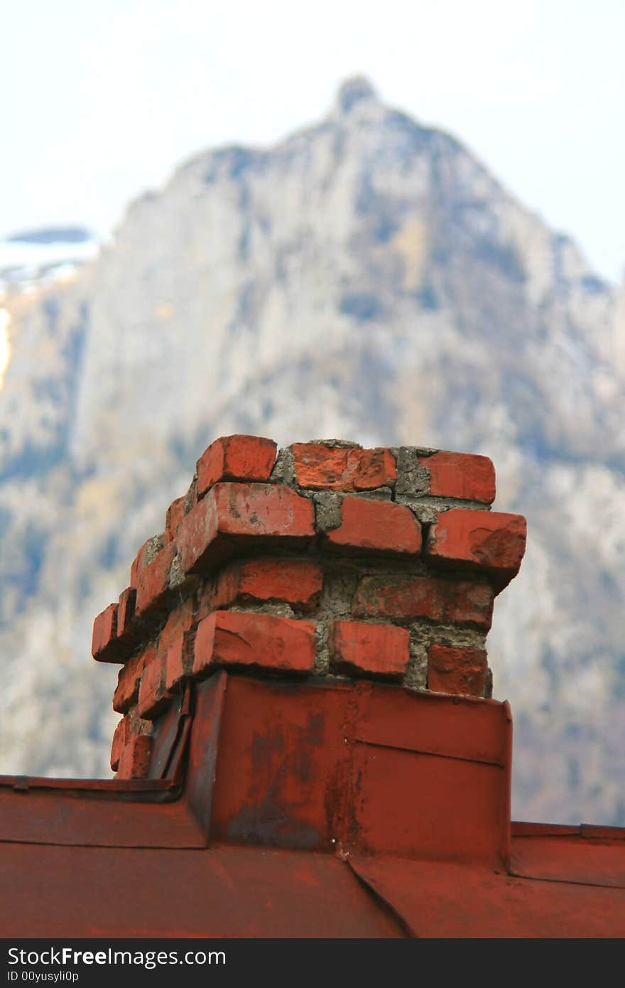 Brick chimney on an old country house