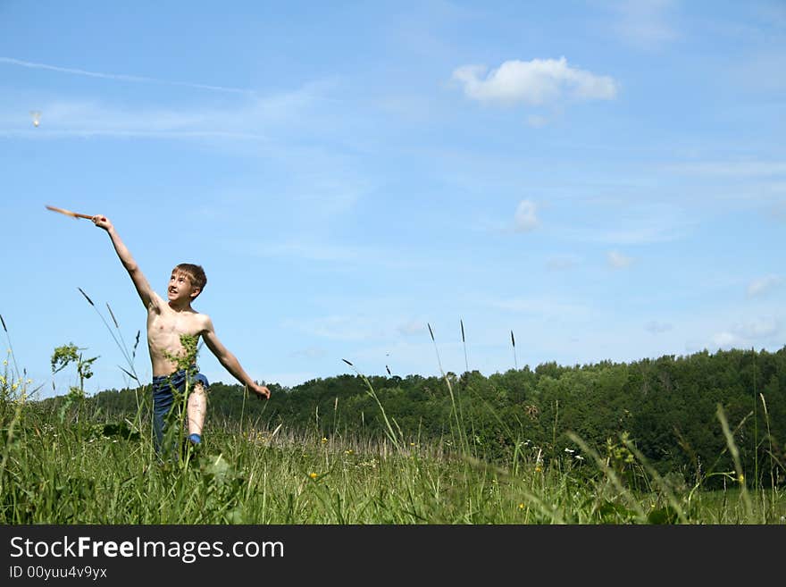 Boy playing at badminton