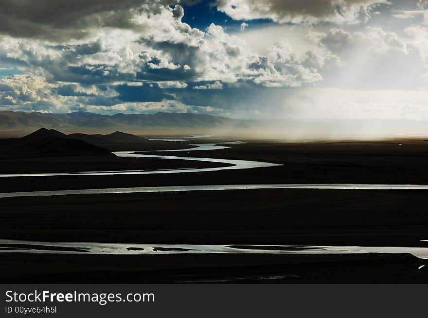 When travelling in Tibet of China in autumn,   headwaters Yellow River on the meadows appear in front of us.