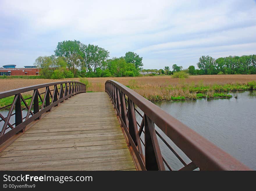 Footbridge Leading Into Field