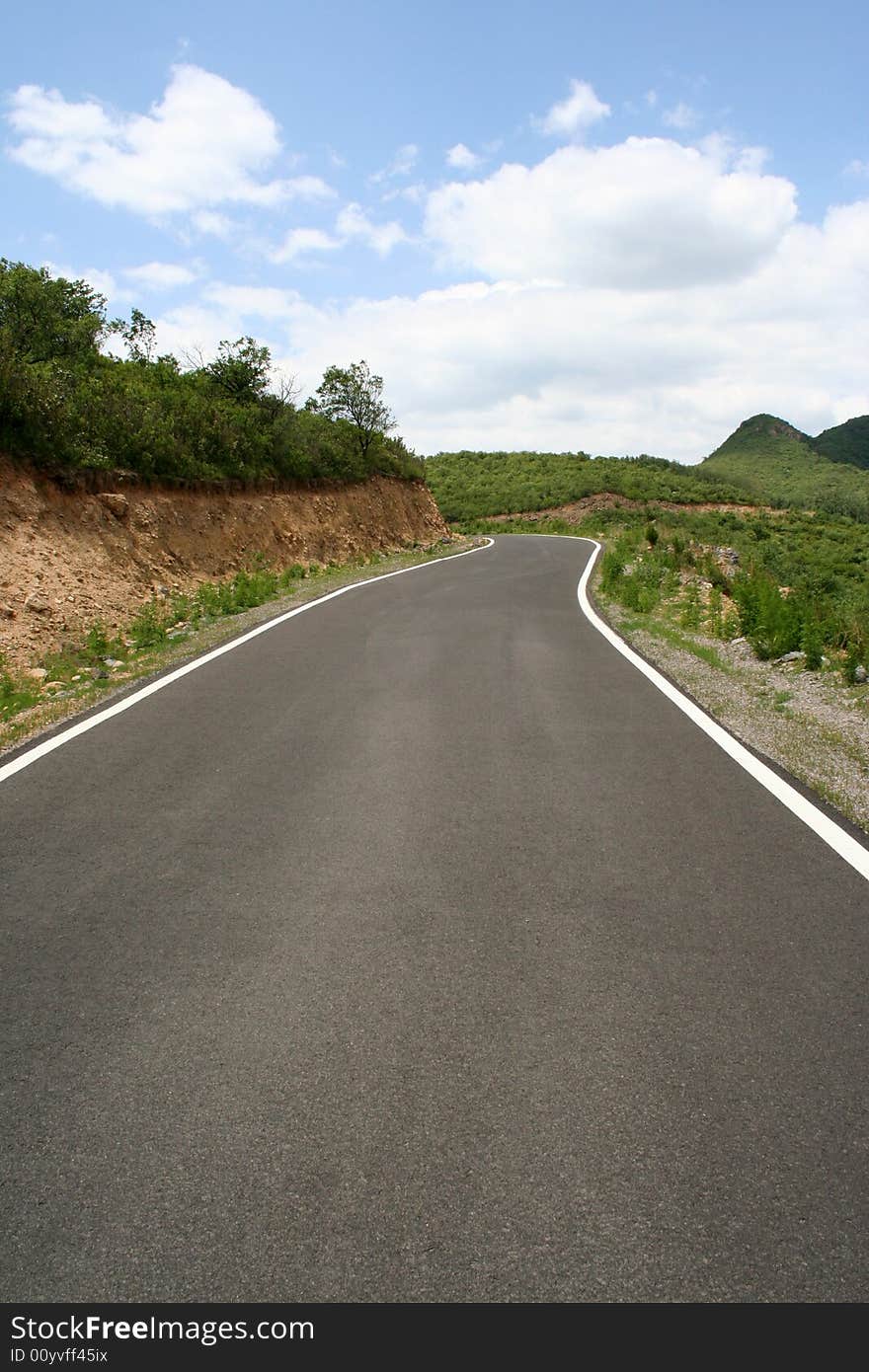 A view of road left turn curve in tibet. A view of road left turn curve in tibet