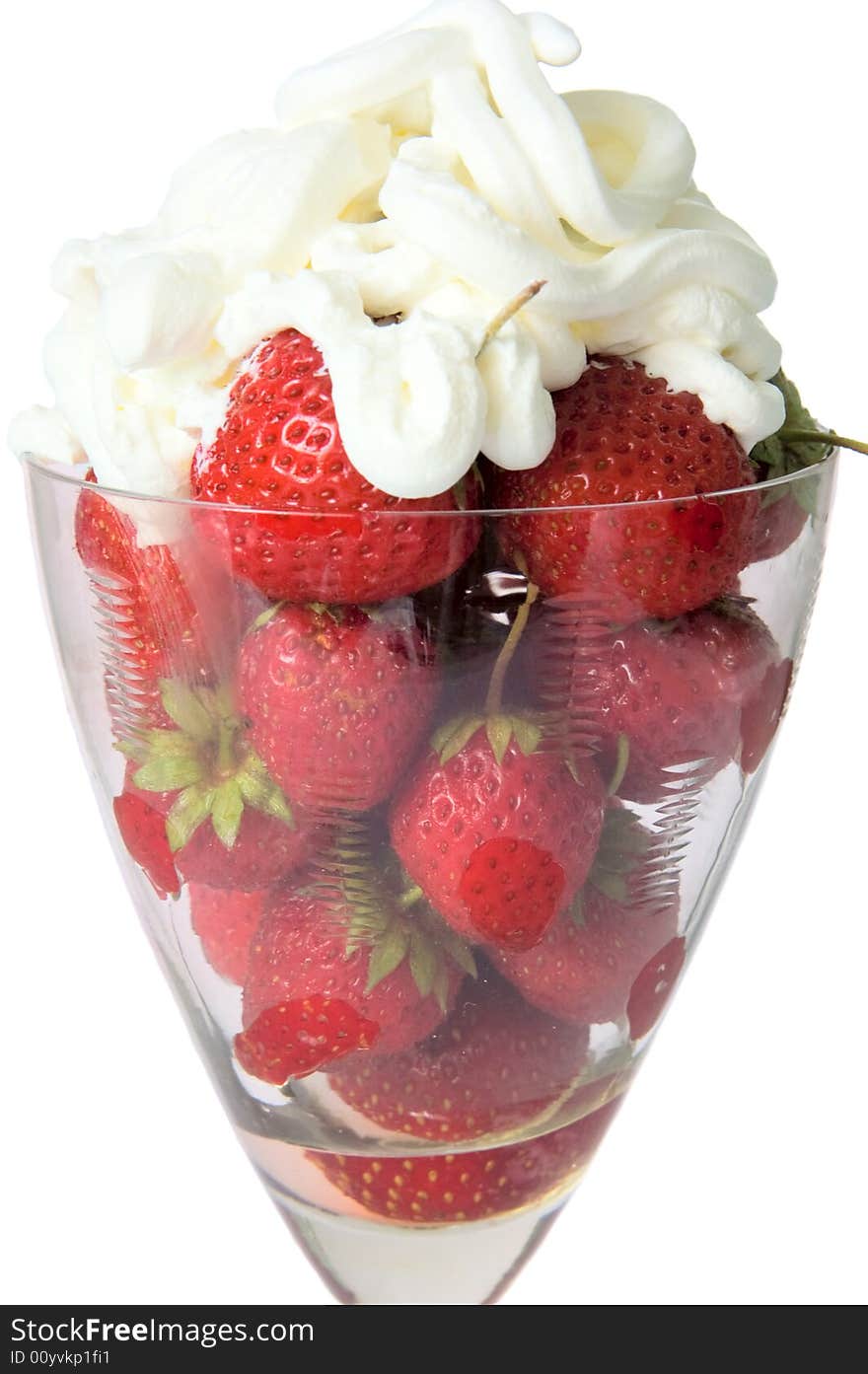 Strawberry with sour cream in a wine glass on a white background. Strawberry with sour cream in a wine glass on a white background