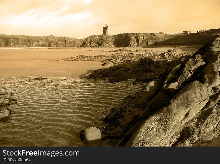 A rocky beach on a warm day with a calm sea an ideal place to have a walk in ireland. A rocky beach on a warm day with a calm sea an ideal place to have a walk in ireland