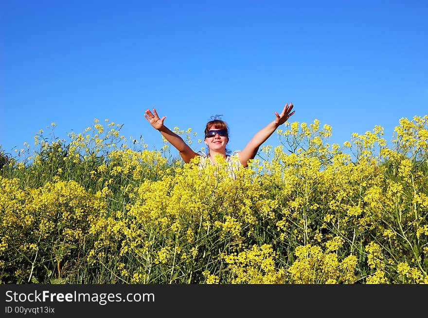 Beautiful girl over a blue sky