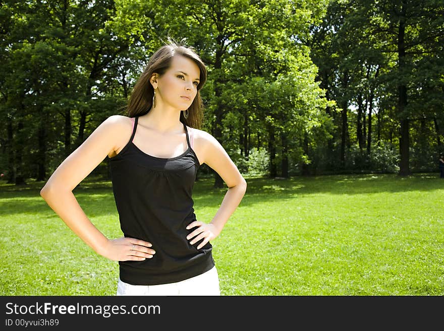 Young Woman Relaxing In The Forest. Young Woman Relaxing In The Forest