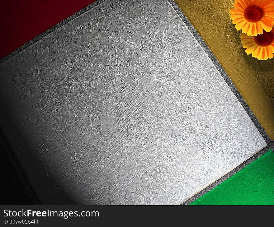 Coloured bricks with two sunflowers