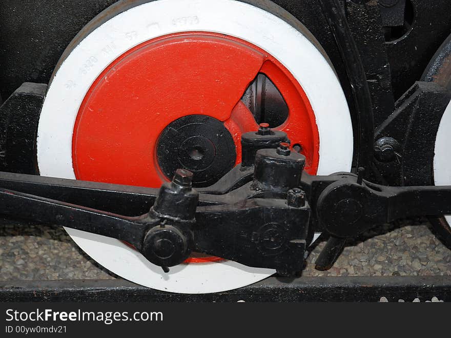 The old colourful train wheel