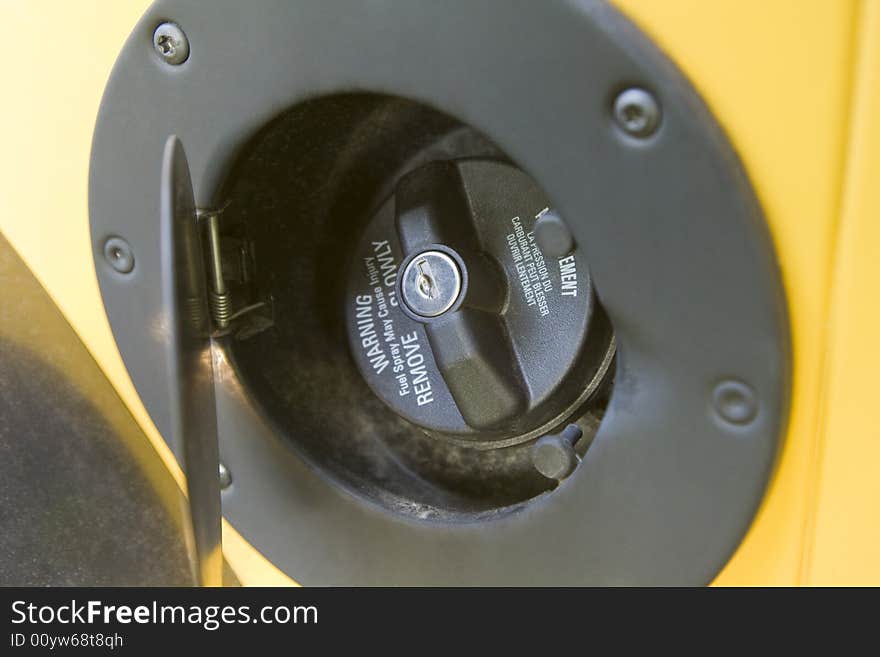 A close up of a locking fuel cap. A close up of a locking fuel cap.