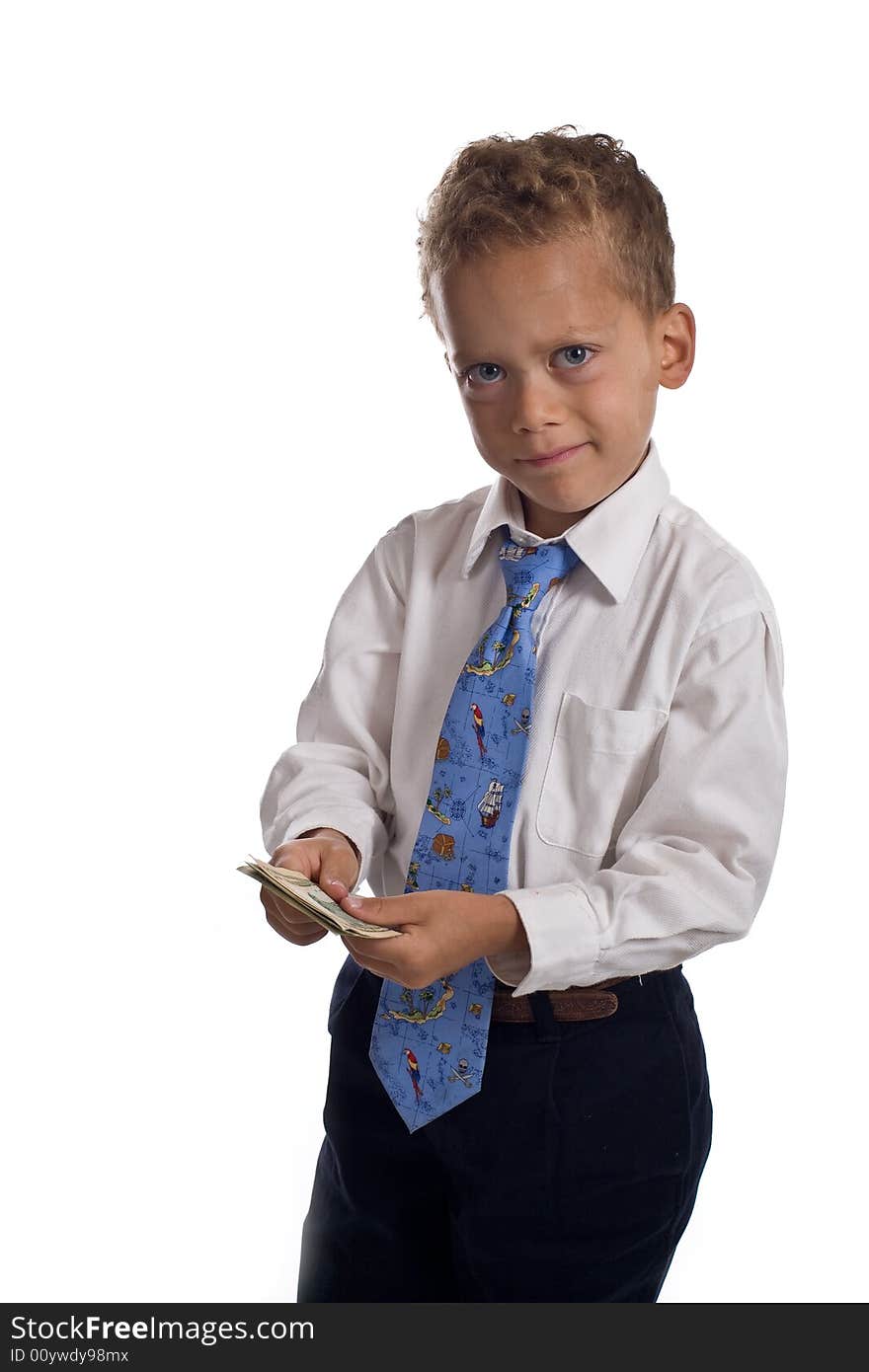 Young boy dressed as businessman holds money - isolated on white