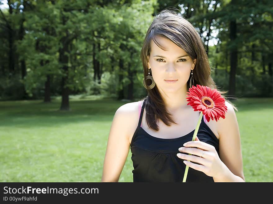 Brunette Model With Red Flower