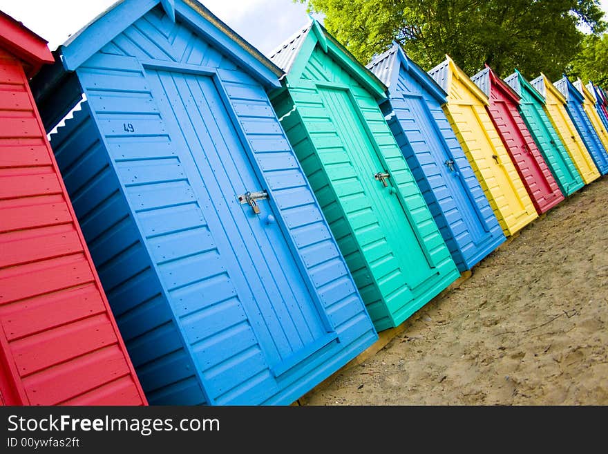 Colourful wooden british beach huts