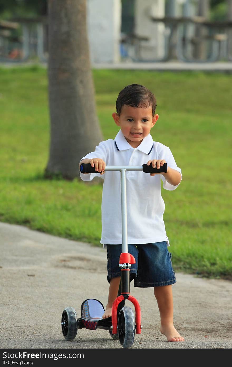 Riding A Scooter In The Park