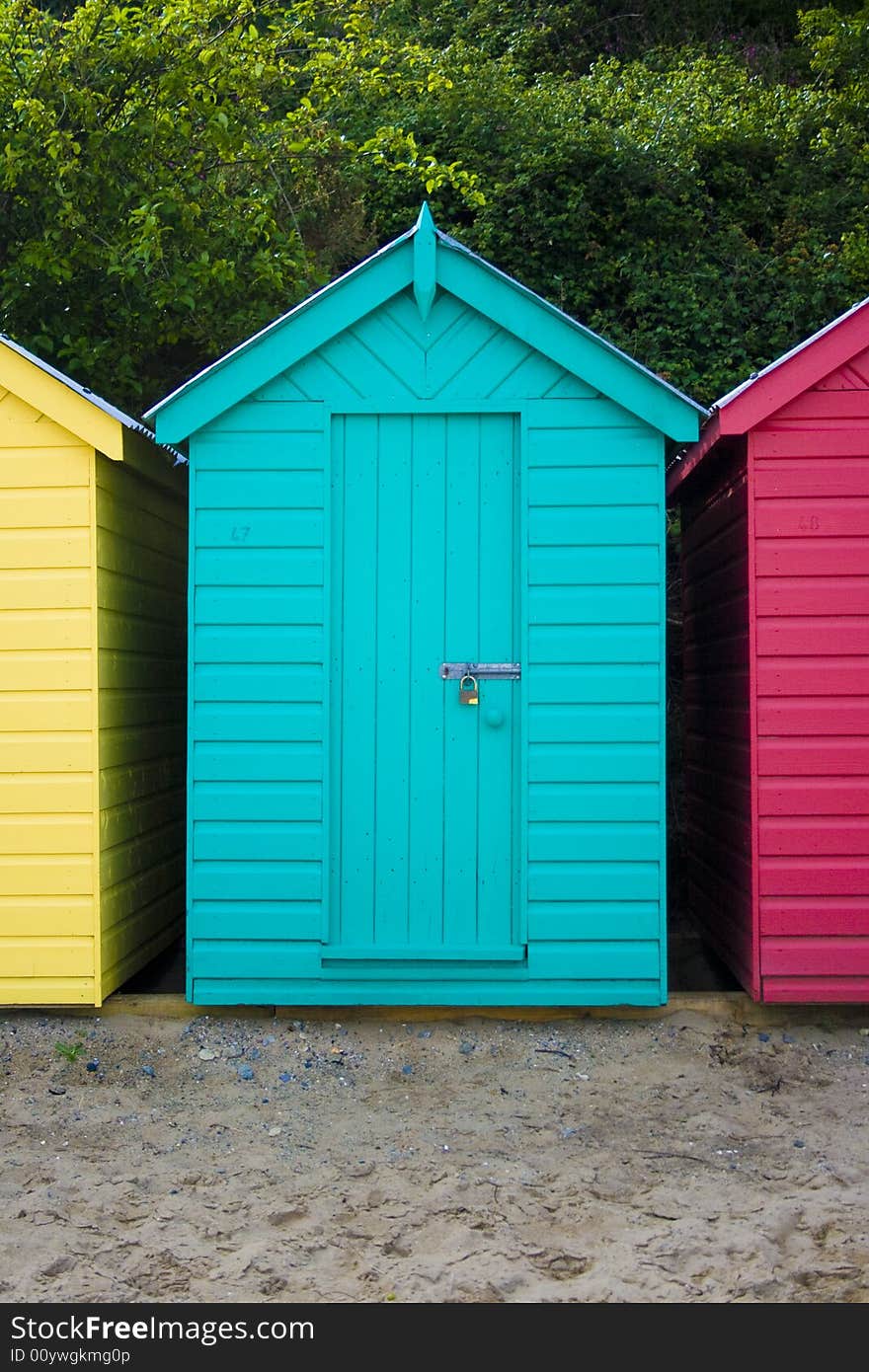 Green wooden british beach hut. Green wooden british beach hut