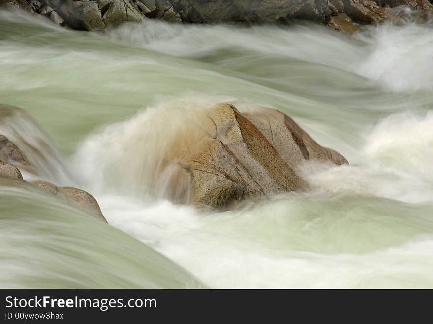 Long exposure of water flowing over rocks