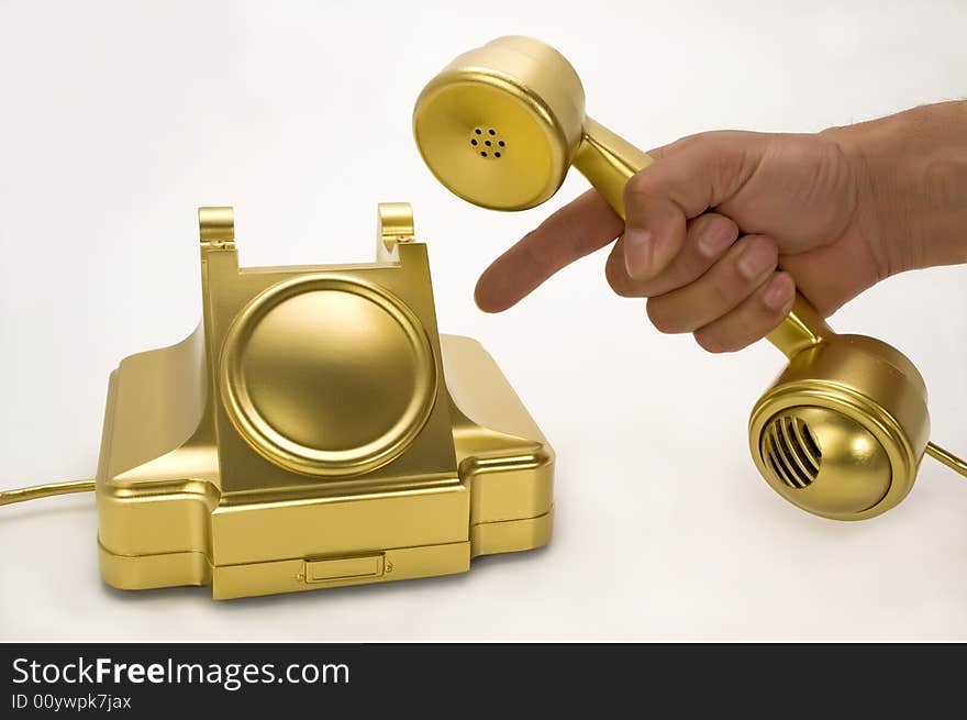 The gold telephone.