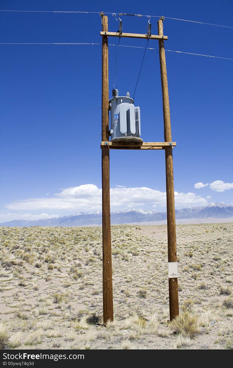 Transformer with mountains in the background.