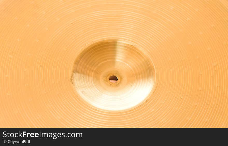 A closeup of a drum set cymbal. A closeup of a drum set cymbal