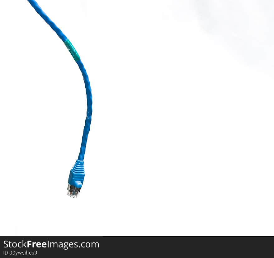 A blue fiberoptic cable isolated on white. A blue fiberoptic cable isolated on white