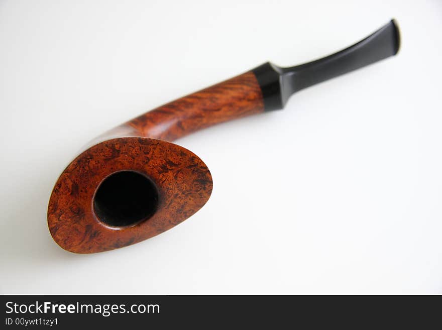 An tobacco pipe on white background.