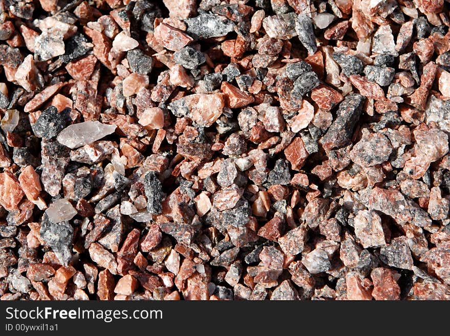 Red granite gravel photo, could be used as a texture