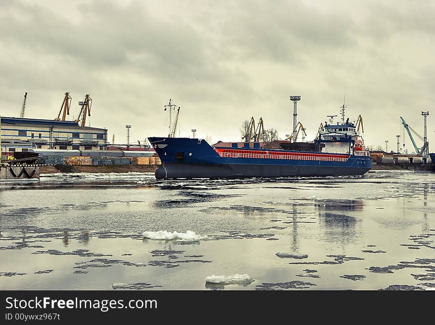 Freight ship in the dock in winter