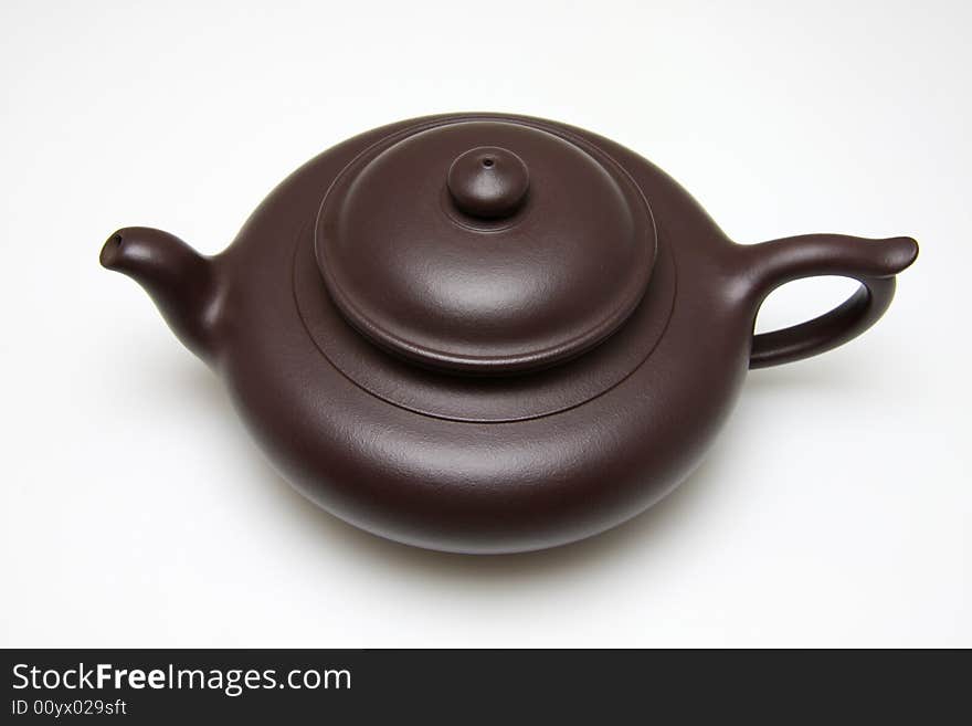 An teapot isolated on white background.