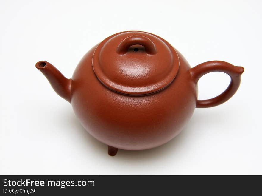 An teapot on white background.