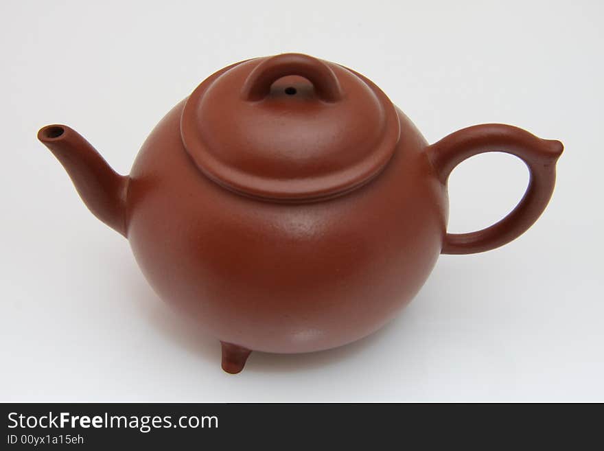 An teapot isolated on white from China.