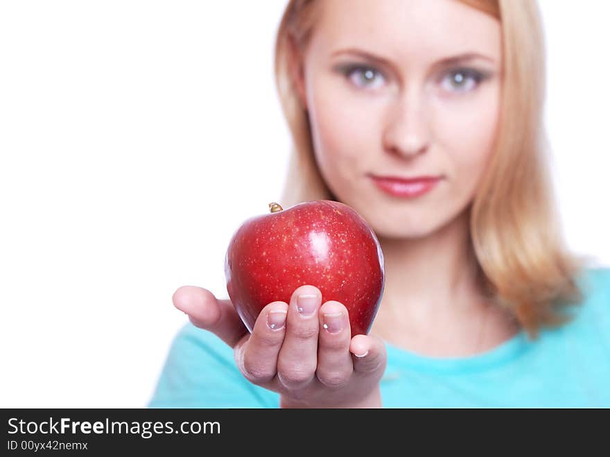 The girl with a red apple on a white background