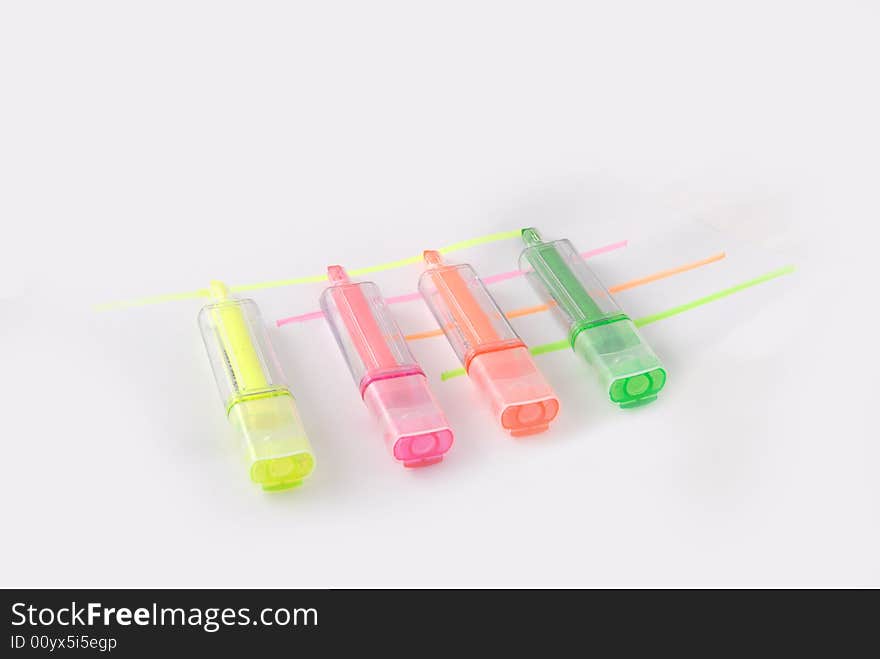 Four different color Highlighting Pens paralelled together