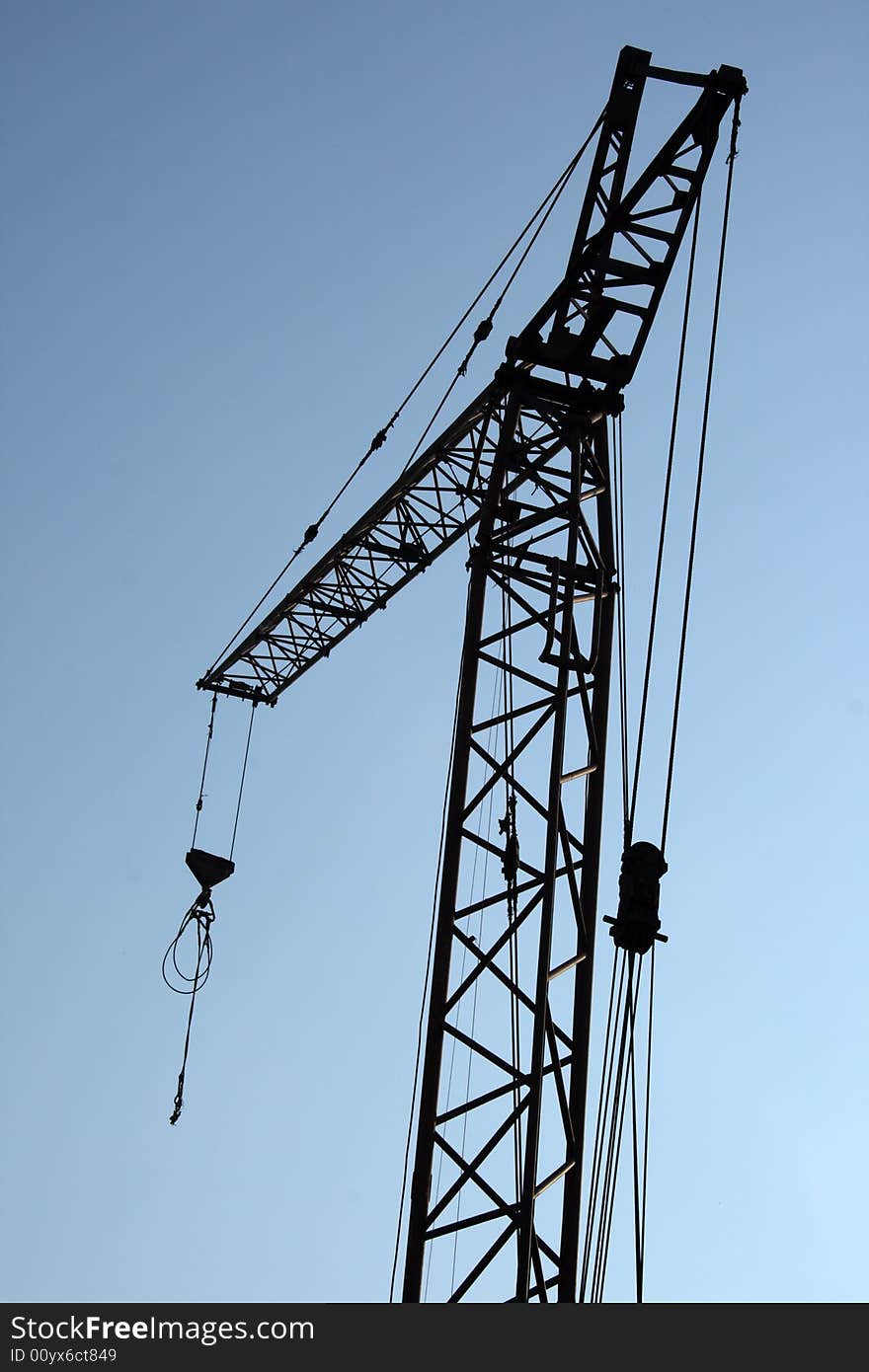 Building cran's hoock on blue sky backgound