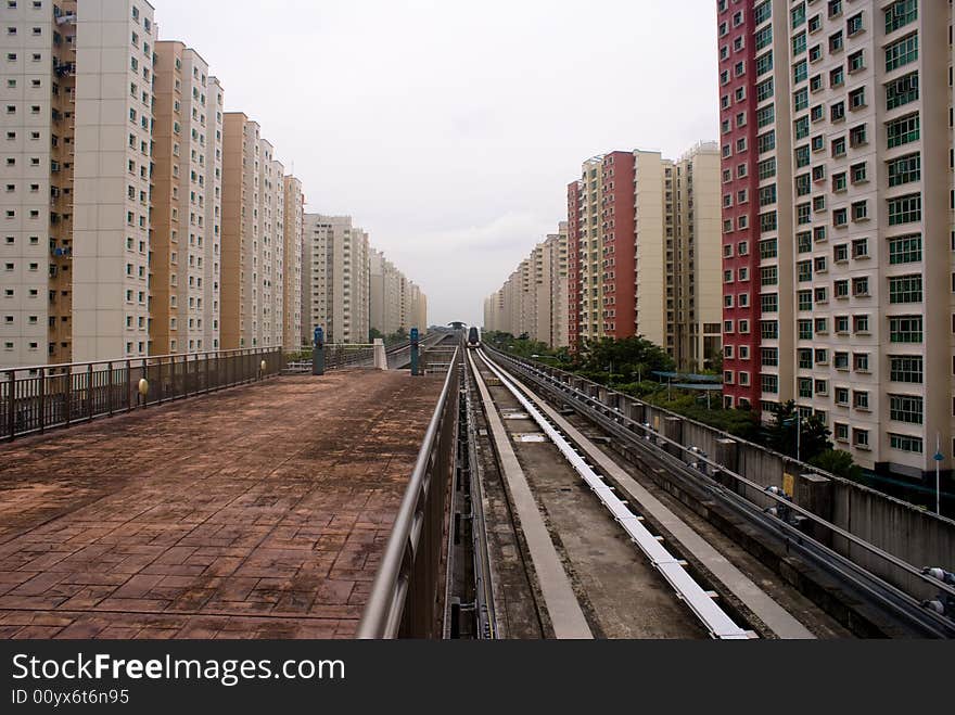 Railways, providing mass transportion, through HDB area, where millions of people live